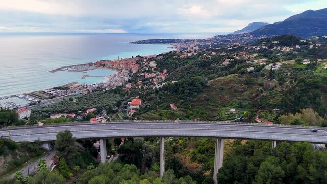 Aerial view of highway viaduct and menton seascape