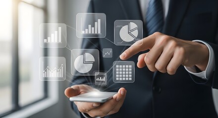 Businessman holding digital finance icons with growth charts and analytics