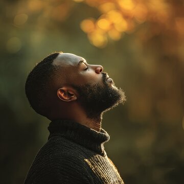 Adult Man Breathing Fresh Air in the Park or Forest. It can be used or mental health, inspiration, and well-being. Suitable for projects conveying messages of relaxation, stress reduction