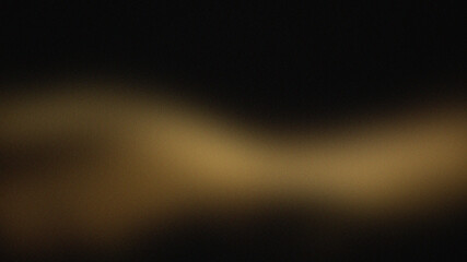 Obraz premium Abstract blurred background with soft golden and dark tones