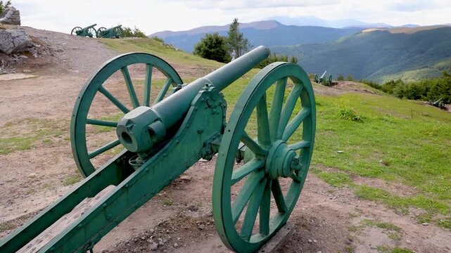 Canon next to Freedom Monument on a Stoletov on Shipka mountain pass in Balkan Mountains, Bulgaria, 4k
