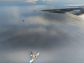 Fishermen with small boats and simple equipment have been fishing since early morning, near the mouth of the Payeti River, directly facing the Waingapu sea  © HeinrichDengi