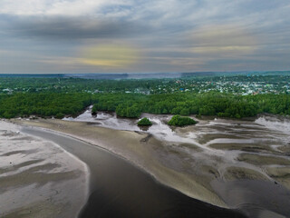 The calm atmosphere of the morning as the sun begins to appear on the eastern horizon of Sumba, near the mouth of the Payeti River, directly facing the Waingapu sea © HeinrichDengi