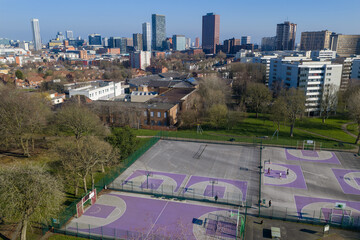 Aerial view of Chamberlain Gardens basketball courts and Birmingham skyline. © bardhok