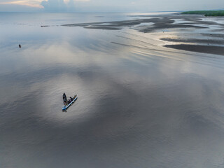 Fishermen with small boats and simple equipment have been fishing since early morning, near the mouth of the Payeti River, directly facing the Waingapu sea  © HeinrichDengi