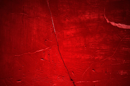 Red wall texture background. scary red wall for background, Old shabby blood paint and plaster cracks.
