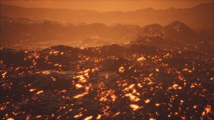 Fiery lava cascades across a rugged terrain under a dramatic orange sky. The scene captures the raw power of nature and the beauty of volcanic activity during twilight. © icetray
