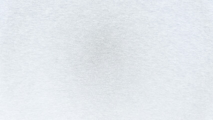 white cotton fabric macro texture reveals delicate woven threads and subtle undulating wrinkles in pristine minimalist serene composition