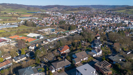Fototapeta premium Aerial panorama of residential neighborhood and small town in rural Germany