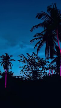 Vertical video: Panning camera reframing palm cluster shifting right at dusk with magenta neon