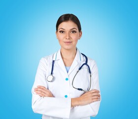 Fototapeta premium Happy young female doctor in uniform with stethoscope