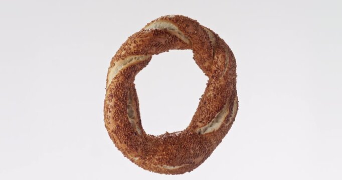 Turkish Bagel Simit revolving on white background