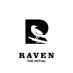 Fototapeta premium Minimalist Raven Bird Silhouette Perched on Branch Logo with Initial Letter R Design
