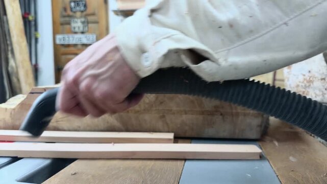 Authentic Maker Clearing Debris to Evaluate Sustainable Timber Slab Focus Shift in Modern Zero Waste Workshop