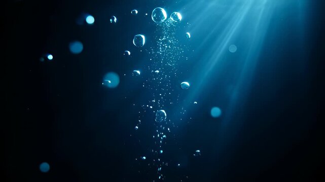 Air bubbles rising through dark blue deep sea water in a cinematic 3D animation, capturing a peaceful underwater atmosphere for abstract backgrounds.