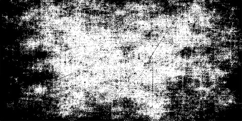 Obraz premium A vintage black and white abstract grunge background featuring a rough textured surface of aged concrete and dirty weathered paper with an antique metal pattern