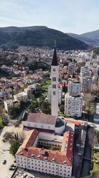 Aerial view of the Peace Bell Tower and Franciscan Church in Mostar, Bosnia and Herzegovina