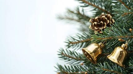Obraz premium Festive spruce branches with golden bells and pine cone