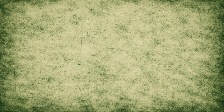A vintage grunge backdrop featuring green grass growing over an aged brown parchment paper texture with a stained antique aesthetic