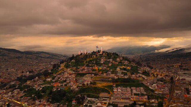 Quito, Ecuador - The Virgin of El Panecillo at sunset during Christmas