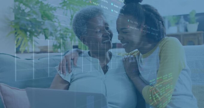 Animation of stock market data processing over african american mother and daughter using laptop
