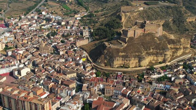 An Aerial panoramic view of the old town of the city  Monzon on a sunny summer noon in Spain.