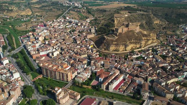 An Aerial panoramic view of the old town of the city  Monzon on a sunny summer noon in Spain.