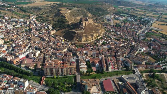 An Aerial panoramic view of the old town of the city  Monzon on a sunny summer noon in Spain.