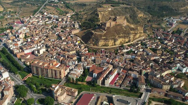 An Aerial panoramic view of the old town of the city  Monzon on a sunny summer noon in Spain.