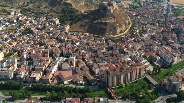 An Aerial panoramic view of the old town of the city  Monzon on a sunny summer noon in Spain.