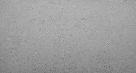 Fototapeta premium Copy space on a rough grey grain textured wall background