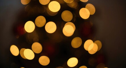 Obraz premium Twinkling Christmas lights creating a soft blurry backdrop for holiday designs