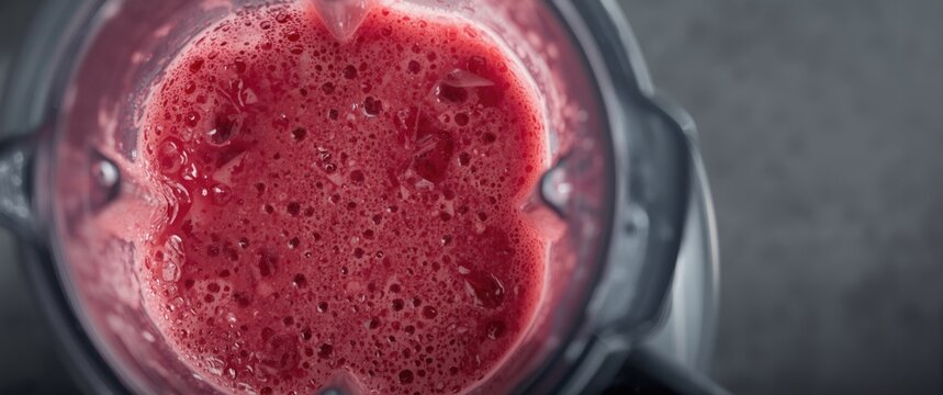 Close up shot of freshly blended fruit smoothies with clear copy space