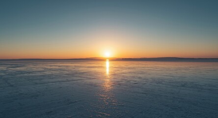 Obraz premium Radiant dawn stretching over flat salt landscape with open sky and copy space