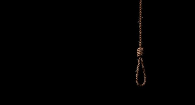 Dark and moody image of a hangmans noose