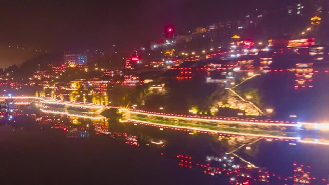 Ancient Town at Night - Aerial View with River Lights