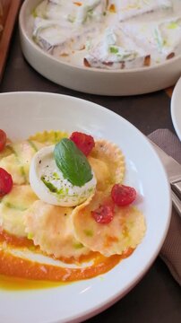 Ravioli tomato sauce main course tasty snack fresh delicious gourmet food on the table rustic food top view copy space. High quality FullHD footage
