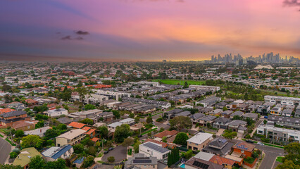 Obraz premium Panoramic Aerial Drone view of Inner Suburbs of Melbourne housing, roof tops, the streets and the parks, the roads and trees of Ascot Vale Moonee Ponds Brunswick Essendon and Maribyrnong in VIC Victor