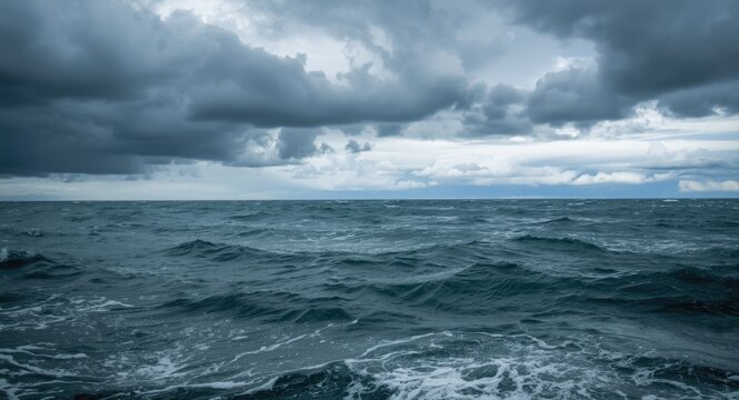 choppy sea surface with aggressive waves and storm clouds