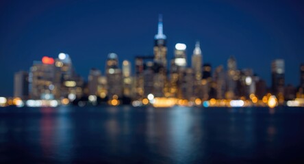 Obraz premium Blurred night urban skyline glowing with bokeh and wireless internet symbol on blue background with copy space