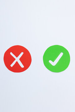 Acceptance and Rejection Symbols on a White Background, Made in Paper. Conceptual Representation of Correct or Wrong Choices, Permitted or Denied Decisions, Suitable for Visual Communication