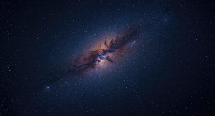 Fototapeta premium Broad cosmic scene featuring a luminous galaxy and countless stars in blue violet hues