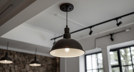 Elegant industrial pendant lighting suspended from white ceiling adding refined modern touch indoors
