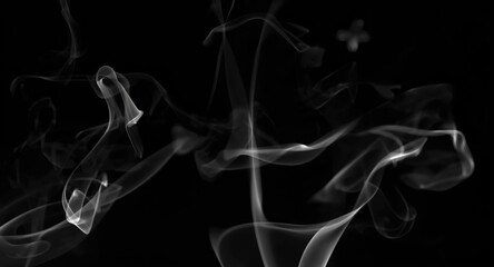 Fototapeta premium Abstract incense smoke patterns on black background designed for Halloween and therapeutic aromatherapy