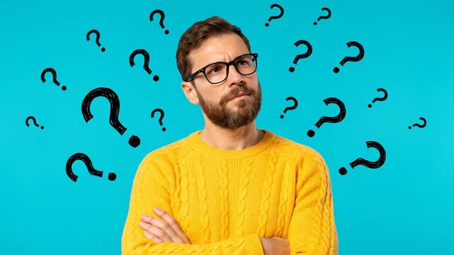 Puzzled man thinks about questions.