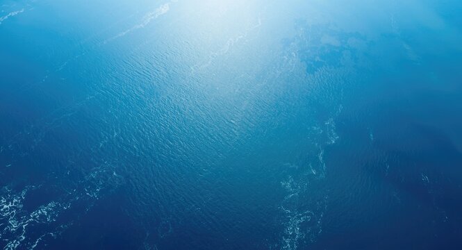 Blue tropical ocean surface seen in detailed global satellite image from space perspective