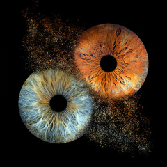 Abstract digital artwork featuring two human eye irises in vivid colors with a particle explosion effect on a dark background. © Iryna