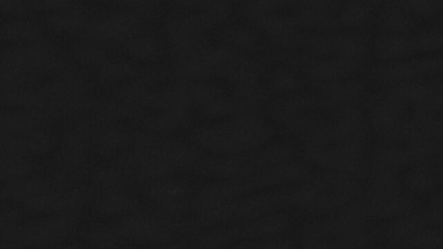 Abstract dark gray pixelated background texture with subtle variations.