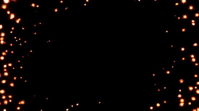 Captivating Display of Glowing Sparks Dancing Against a Dark Background, Creating a Mesmerizing and Luminous Atmosphere of Enthralling Energy and Wonder.