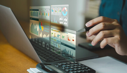 Business data analytics dashboard visualization with charts graphs and financial report interface on laptop screen